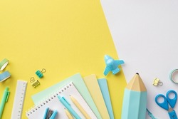 Back to school concept. Top view photo of colorful notepads plane shaped sharpener pencil-case pens stapler binder clips scissors ruler adhesive tape bicolor yellow and white background with copyspace