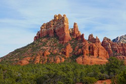 The spectacular afternoon colors of Sedona`s legendary Camel Head Rock sandstone formation.