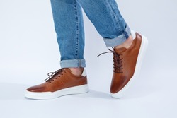 Men's casual shoes are brown with natural leather, men on the shoe in brown lace shoes. High quality photo