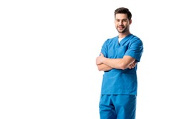 Male nurse wearing blue uniform standing with folded arms isolated on white