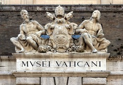 Sculptures above an entrance to the Vatican Museum in Rome, Italy