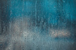 spray on glass , water drops , blue evening , rain window