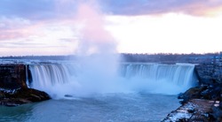 A long exposure photograph of Niagara Falls, Ontario with the camera set on a tripod. 