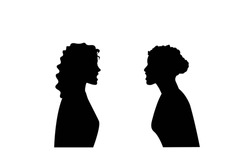 Silhouette of two women. They are angry and shouting face to face