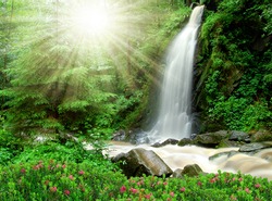 beautiful waterfall in the National Park Tercino valley in the mountains Novohradske-Czech Republic
