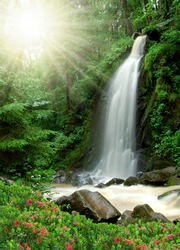 beautiful waterfall in the National Park Tercino valley in the mountains Novohradske-Czech Republic