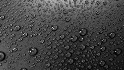 Water drops rain or droplet on black background.
Condensation is the process of a substance in a gaseous state transforming liquid.