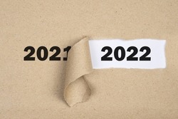 
Message Year 2021 replaced by 2022 torn craft paper texture background.
Good bye 2021 hello to 2022 happy New Year coming concept.