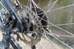 bicycle parts rear wheel brake disc cassette fragment frame - across