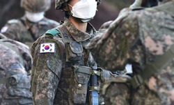 Korean Army Soldier wearing a Mask for Coronavirus.