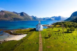 Aerial view of Gimsoy church and cemetery on Lofoten Islands in Norway