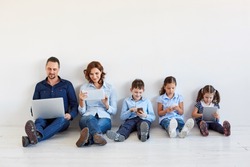 Large family with gadgets