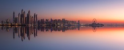 Panorama of Dubai Marina skyline at sunset