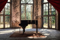 An old piano in a beautiful lost place