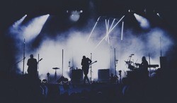 Bands silhouettes on a concert
