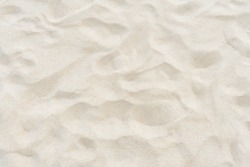 Full frame shot. Close up sand texture on beach in summer.