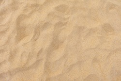Texture of beach sand as background.