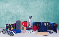 Composition of different promo products -Thermo mug, mug, gifts, flash drive, pens, notebooks,tie,Lanyards Neck Strap,Keychain.