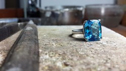 Blue topaz ring on table jewellery making