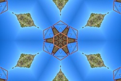Photo of an abandoned water tower manipulated with fractal mirroring to create a strange multi-dimensional abstract pattern.