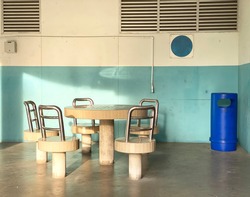 Stone stools and tables at void deck for residents to mingle