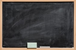 Blank Blackboard Background. Chalk and eraser on the frame