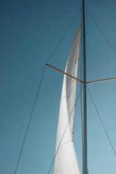Yacht sail blowing in the wind
