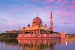 A perspective shot of the beautiful and colourful Putra Mosque which stands as the major landmark by Putrajaya Lake in Precinct 2, Putrajaya, Malaysia