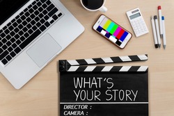 What's your story.text title on film slate and smartphone are playing movie.