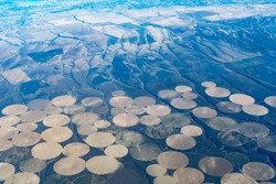Aerial view of crop circles and crop squares from Idaho near the snake river. Circle shaped fields and square shaped fields