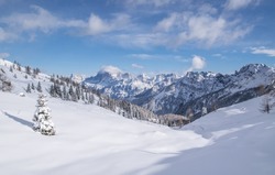 Winter panorama of the peaks of Mount Pelmo and Mount Civetta's peaks seen from Valles Alpine Pass during the winter season on a beautiful sunny day, winter alpine landscape in the unesco Dolomites.