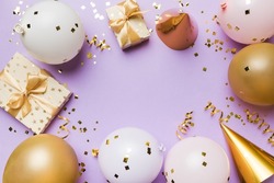 Flat lay party decoration concept on pastel colored background from above. Love concept. Holiday celebration. Valentine Day or birthday party decoration.
