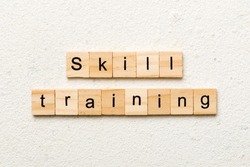 skills training word written on wood block. skills training text on cement table for your desing, concept.