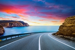 summer landscape on the highway. highway landscape at colorful sunset. Road view on the beach in summer time. colorful seascape with beautiful road. European highways. colorful nature landscape.
