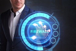 Business, Technology, Internet and network concept. Young businessman working on a virtual screen of the future and sees the inscription: Firewall