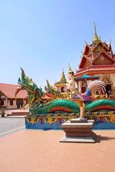 Statues of kinnaris and snakes-nagas near to Pavilion in Pulau Tikus, thai Buddhist temple (Wat Chayamangkalaram), famous tourist attraction in Georgetown, Penang island, Malaysia