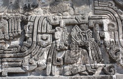 Bas-relief carving with of a american indian chieftain, pre-Columbian Maya civilization, Temple of the Feathered Serpent in Xochicalco, Mexico. UNESCO world heritage site