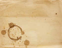 Texture - a sheet of the old paper with drops of coffee