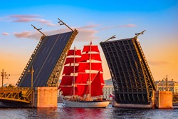 Saint Petersburg. Russia. A ship with scarlet sails passes under the Palace bridge. White nights in Saint Petersburg. Holiday Scarlet sails. The sailing ship on the Neva. Bridges Of St. Petersburg.