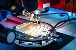 Manufacturing micro transistors. Production microcircuit boards close-up. Microchip manufacturing. PCB technology. Manufacture of microprocessors under microscope. Automatic PCB Production Equipment