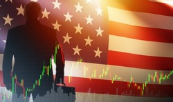 American business. US investments. USA trading, American stock exchange. Businessman stands with his back against the background of the flag of United States of America. Investor and stock quotes.