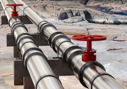 Gas pipeline. Two gas pipes with red valves. Pipeline for transfer of hydrocarbons. Steel pipeline on rocks. Gas start and import concept. Sale of propane and methane. 