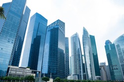 Commercial building in business disctrict of Singapore at noon