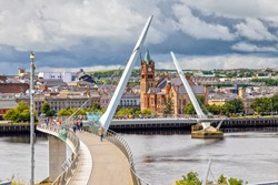 The Peace Bridge and Guild Hall in Londonderry / Derry in Northern Ireland