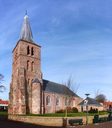 The protestant church in Domburg village with its gothic brick tower in Veere municipality, Zeeland, the Netherlands