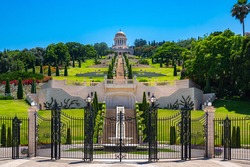 Beautiful symmetric view of the Terraces of the Baháʼí Faith, also known as the Hanging Gardens of Haifa, leading up to the Shrine of the Báb, located on on Mount Carmel in Haifa, Israel
