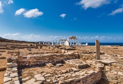 Archaic sanctuary in the archaeological site of Mandra, on the uninhabited Greek island of Despotiko in the Cyclades archipelago, with the reconstructed temple of Apollo and Artemis