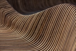 Brown red real walnut wooden furniture panel round circle spiral pattern fractal background. Furniture wall decoration element. Wooden decoration element fractal background. Spiral fractal pattern