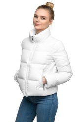 Young woman model posing in white down jacket isolated on white background
