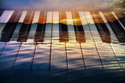 classical music background photo double exposure of piano keys and sunset of a sea landscape